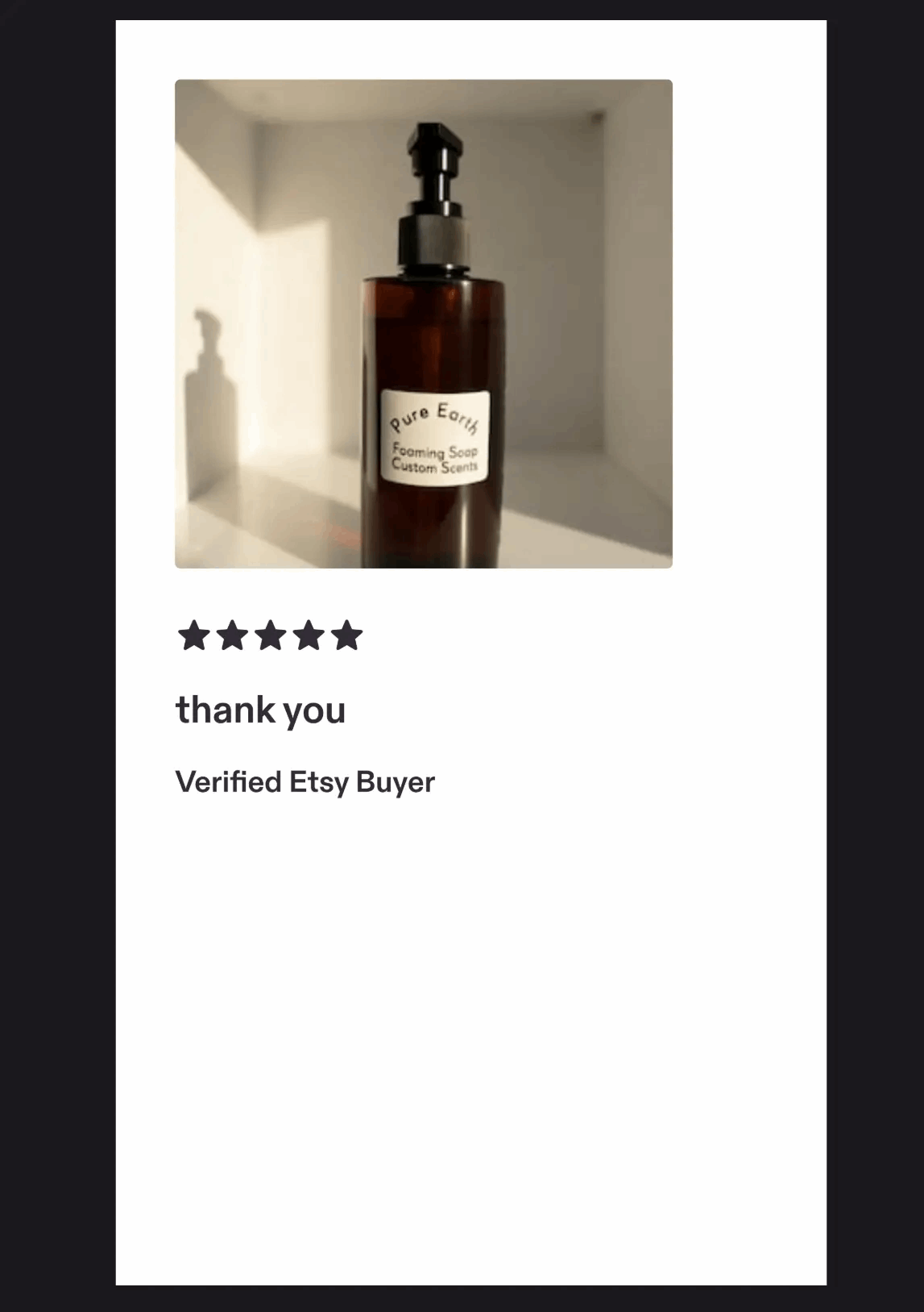 Pure Earth natural foaming hand soap bottle with elegant shadow.